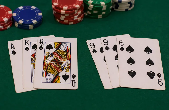 Two three-card Teen Patti hands side by side on felt ready for comparison
